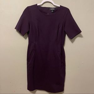 Purple body con dress with pockets